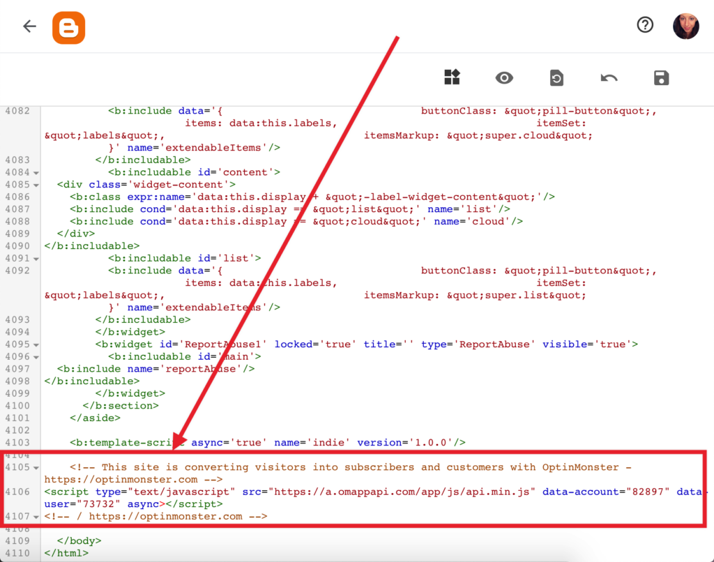 Paste the OptinMonster embed code in your Blogger template file.